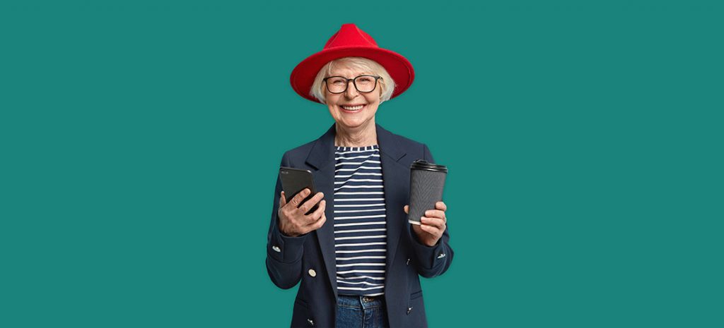 Lady with a coffee cup and mobile