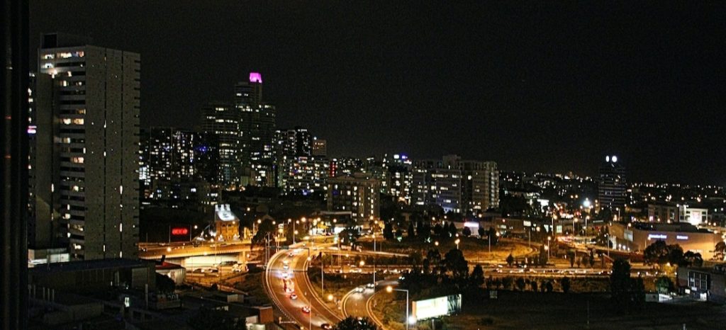 Image shows city lights at night